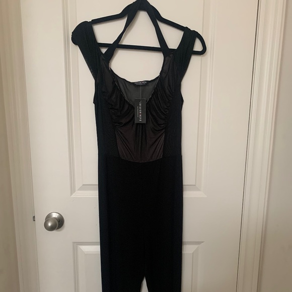 Black jumpsuit with mesh detailing - Picture 1 of 4
